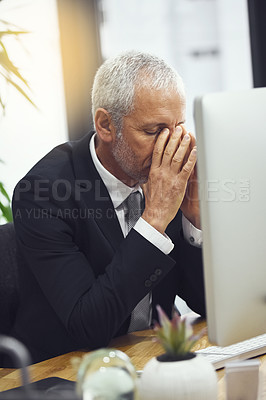 Buy stock photo Business, fail and senior man with headache while working on computer in office, annoyed and anxiety. Burnout, migraine and elderly male manager frustrated with online glitch, 404 or bad review