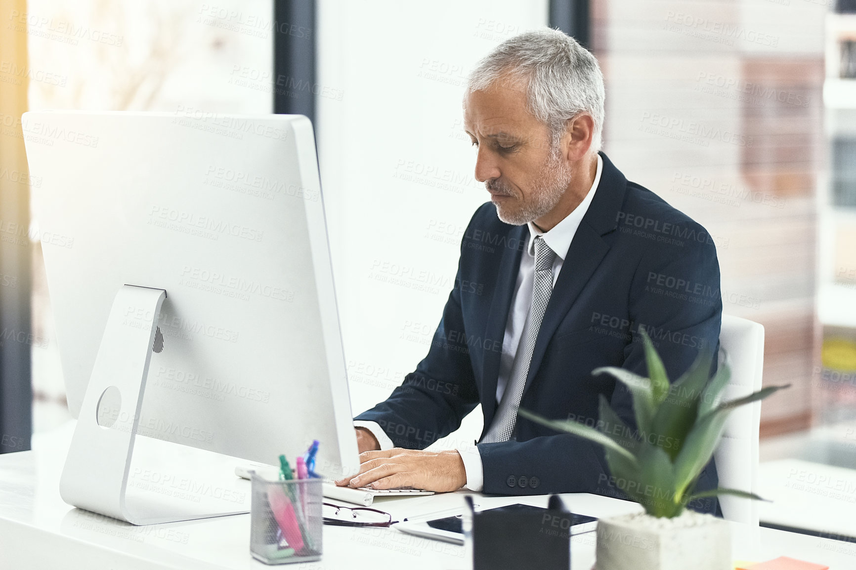 Buy stock photo Mature man, office and typing on computer for internet research, online and information as lawyer. Entrepreneur, pc and write email for connection, networking and legal advice or company growth