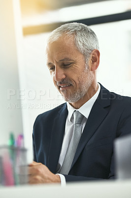 Buy stock photo Computer, management and mature business man at desk in office as CEO of corporate company. Desktop, job and work with happy boss or manager at table in professional workplace for online report