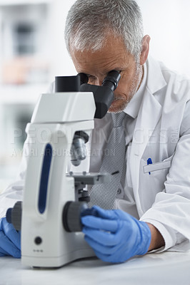 Buy stock photo Study, mature man and microscope in lab for discovery, medical research and test for forensics. Male person, control and doctor for biology or pathology exam, lens and check results of experiment