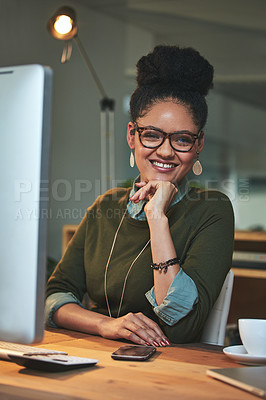 Buy stock photo Portrait of an attractive young woman working on her computer in the office