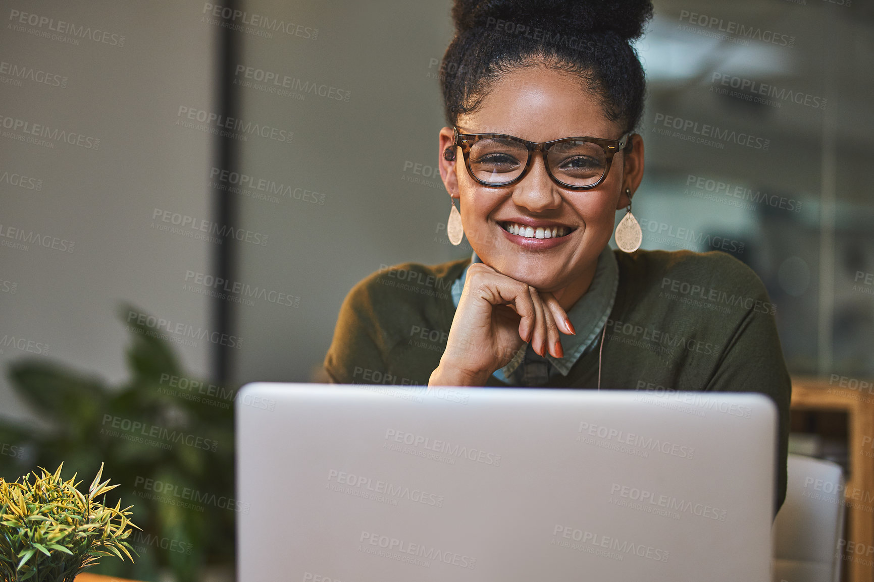 Buy stock photo Shot of a happy businesswoman using wireless technology in her office