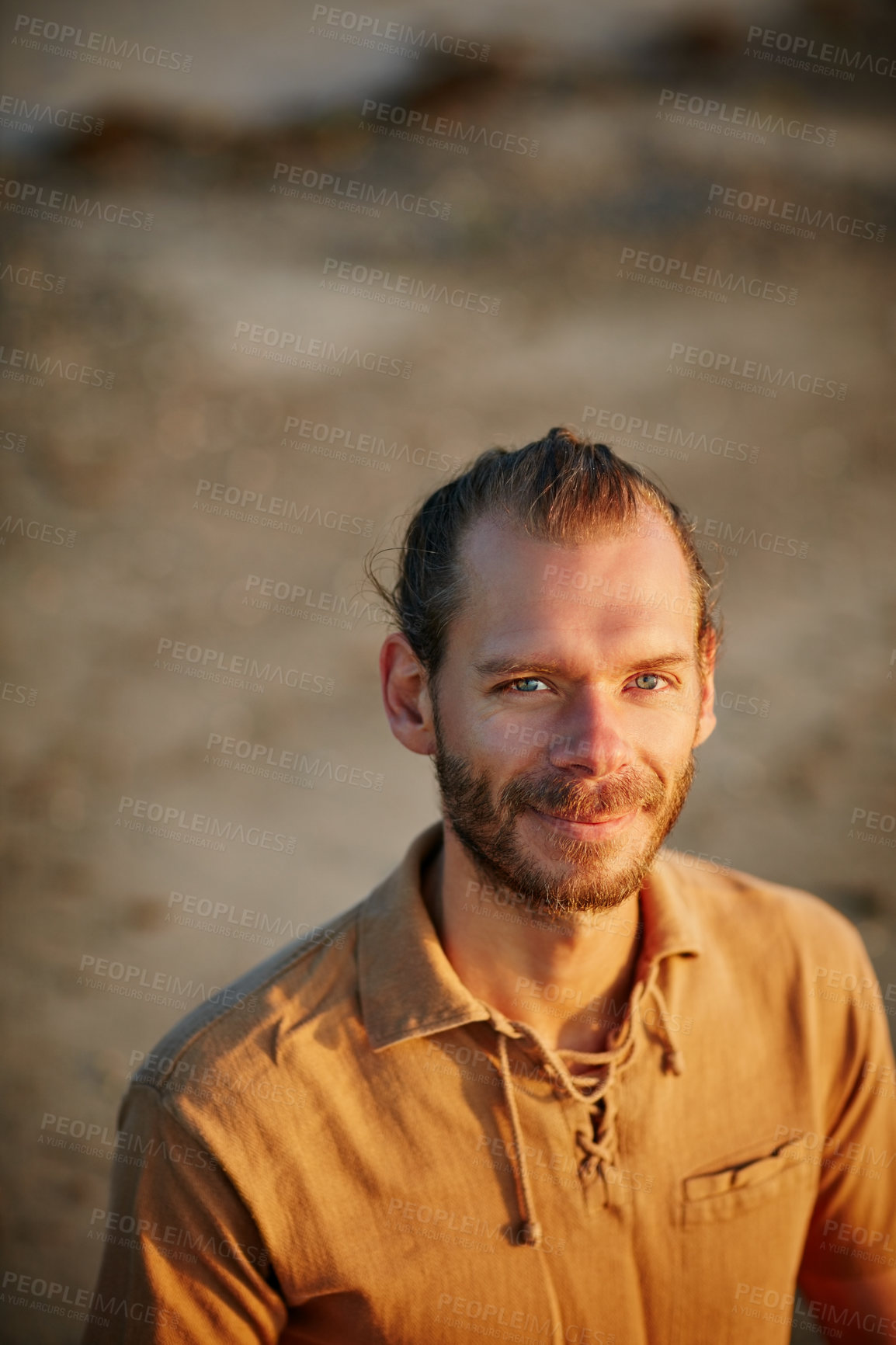 Buy stock photo Portrait of a man spending a relaxing day at the beach