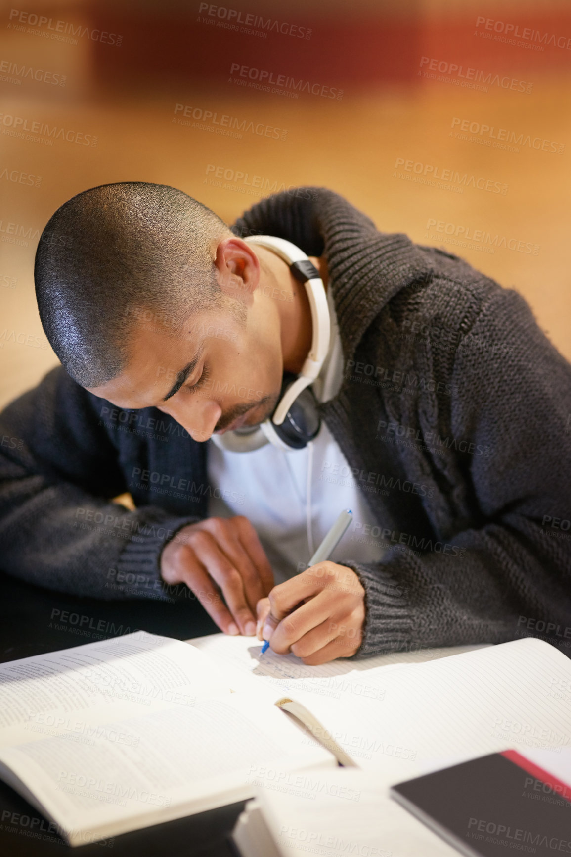 Buy stock photo Cropped shot of a college student working at campus