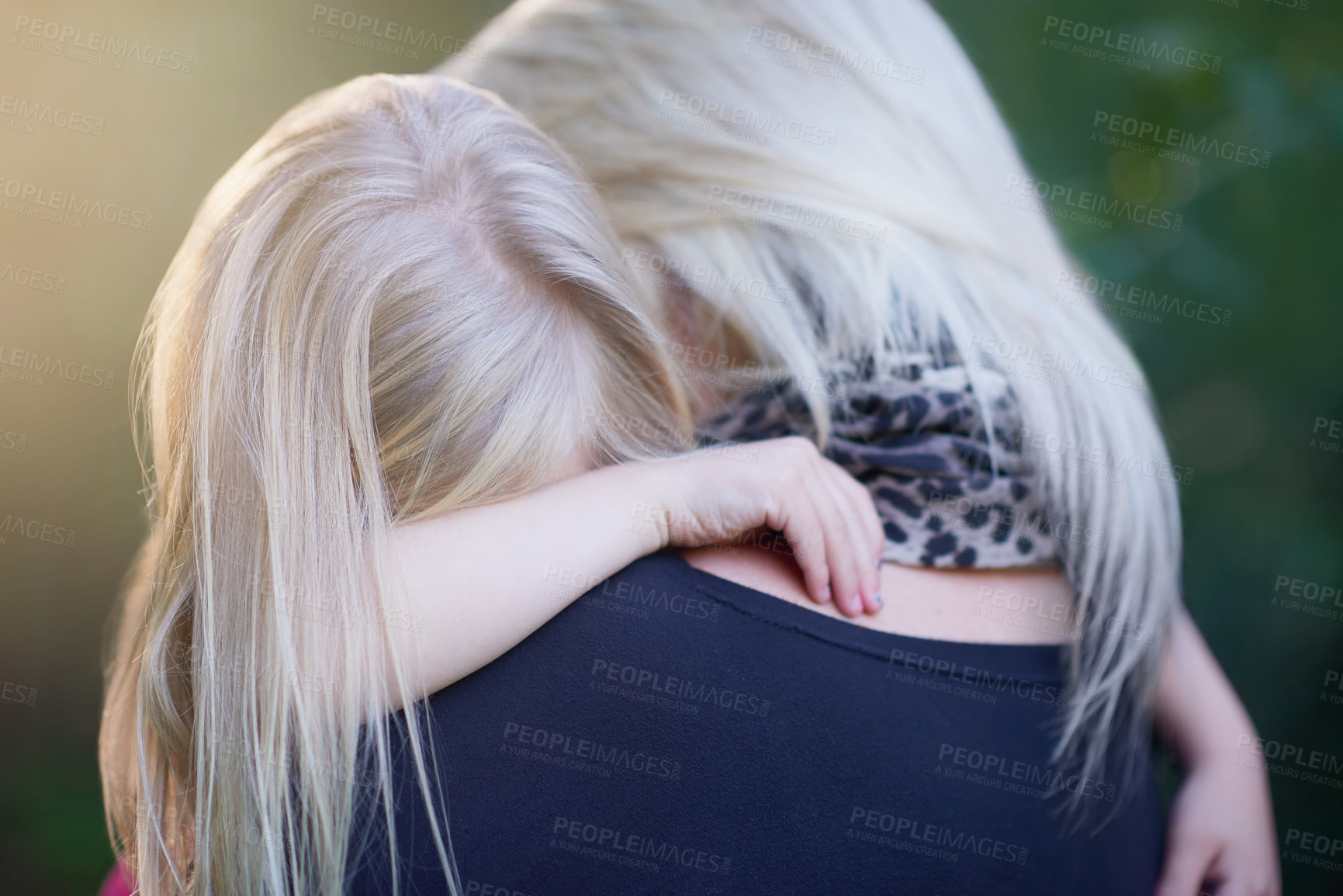 Buy stock photo Cropped shot of a mother consoling her little girl