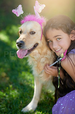 Buy stock photo Portrait of a cute little girl playing dress up with her dog outside