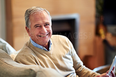 Buy stock photo Shot of a senior man relaxing at home