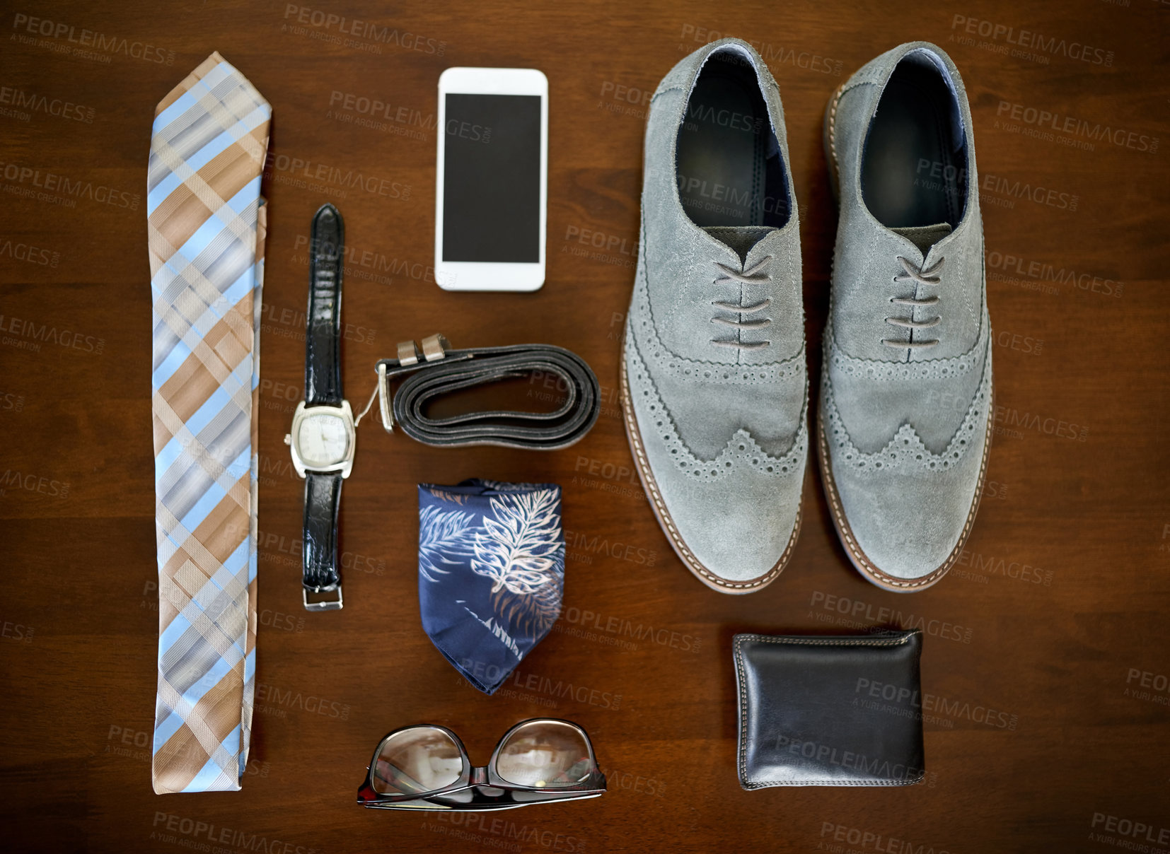 Buy stock photo High angle shot of a stylish business outfit and accessories laid out on a table