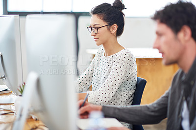 Buy stock photo Woman, man and working at agency with technology for internet, planning and profession. Employees, computer and together for editing in workplace with teamwork, graphic design and writing notes