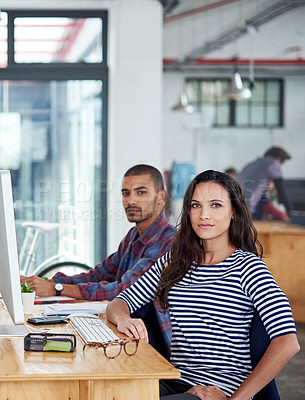 Buy stock photo Teamwork, portrait and colleagues at desk in office for planning, collaboration or strategy for creative project. Design, confident and diverse employees for startup, employment or artistic workplace