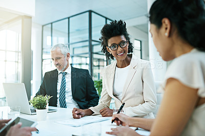 Buy stock photo Meeting, smile and team of business people in discussion, planning or brainstorming ideas in corporate office. Consultant group, collaboration and conversation on laptop for strategy or writing notes