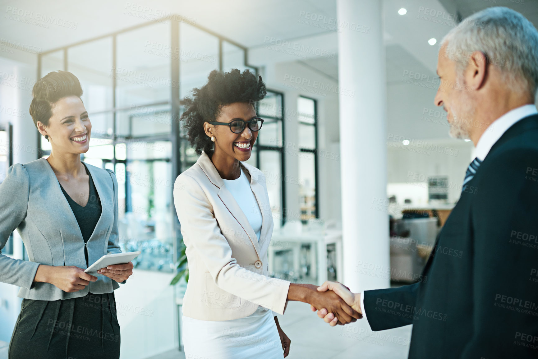 Buy stock photo Businessman, woman and handshake for success in office for promotion or partnership deal. Happy, corporate and people for introduction or collaboration on achievement on negotiation for mission goal