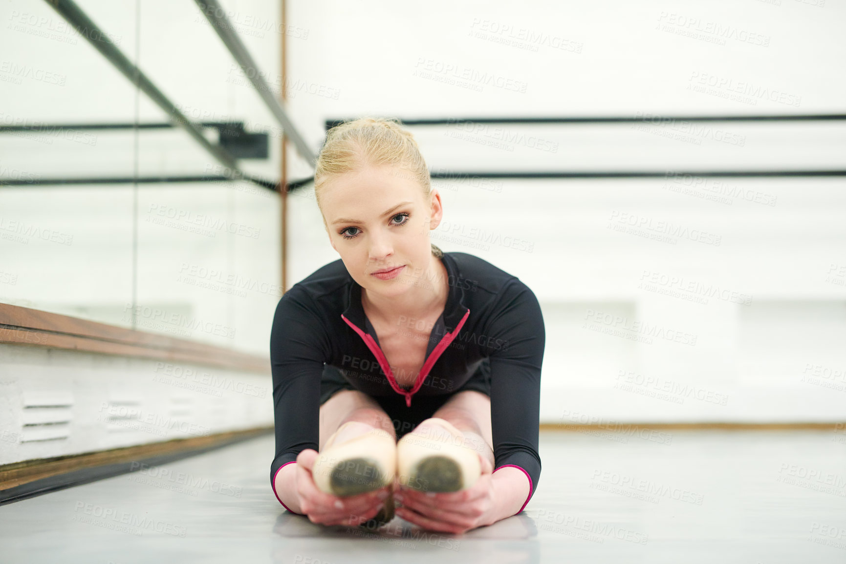 Buy stock photo Shot of a young woman practising ballet