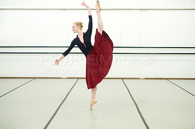 Buy stock photo Woman, ballet and dancing in studio for fitness, exercise and training for performance or show. Young female ballerina, rehearsal and elegant indoor at school of art for creative, artist and barre