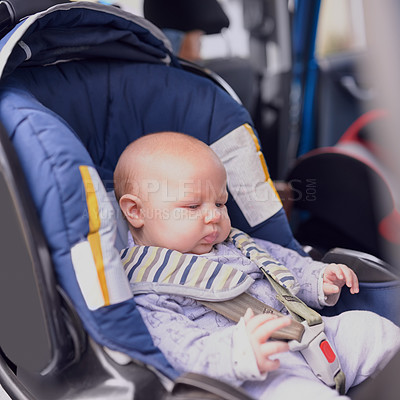 Buy stock photo Baby, boy and travel in car seat for adventure with safety or support for road trip on vacation or holiday on weekend. Infant, child and relax on chair for protection on journey with family