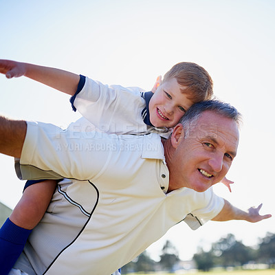Buy stock photo Happy, dad and son with back ride in portrait for bonding, fun and relax on summer holiday or weekend. Excited, father and boy with airplane game outdoor in nature for family love, support and care
