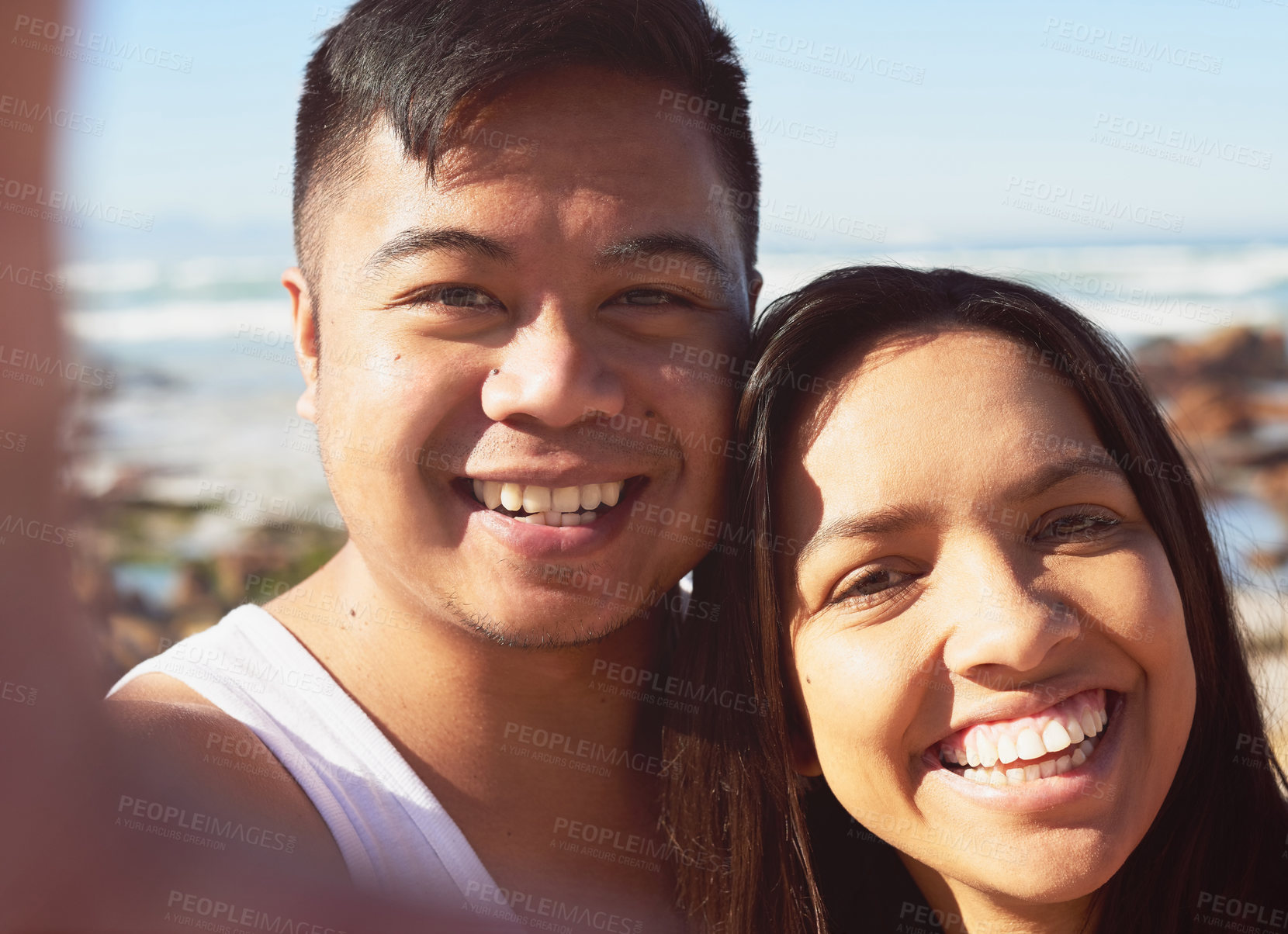 Buy stock photo Selfie of a happy young couple by the sea together