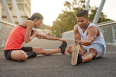 Buy stock photo Fitness, exercise and couple stretch on bridge for health, wellness or warmup for run. Man, woman and training on road for cardio, preparation and workout together in city for marathon, jog or sprint