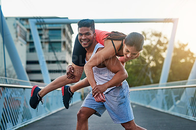 Buy stock photo Carry, sports and happy couple in portrait for fitness on holiday, vacation and weekend in city. Lifting, wrestling or man playing with woman or smile on bridge in exercise workout or training in USA