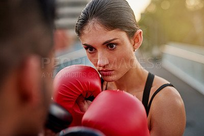 Buy stock photo Girl, boxing gloves and outdoor for training, mentor and female boxer or athlete, road and fitness. Exercise, wellness and sports for martial arts, trainer and work out in cardio, workout and coach