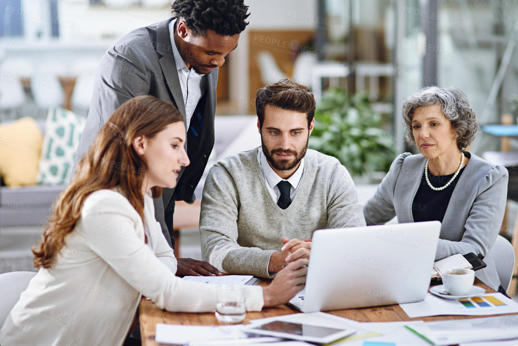 Buy stock photo Teamwork, discussion and laptop for project in workplace for business meeting, review and planning. Technology, men and women with diversity in office for collaboration, brainstorming and ideas 