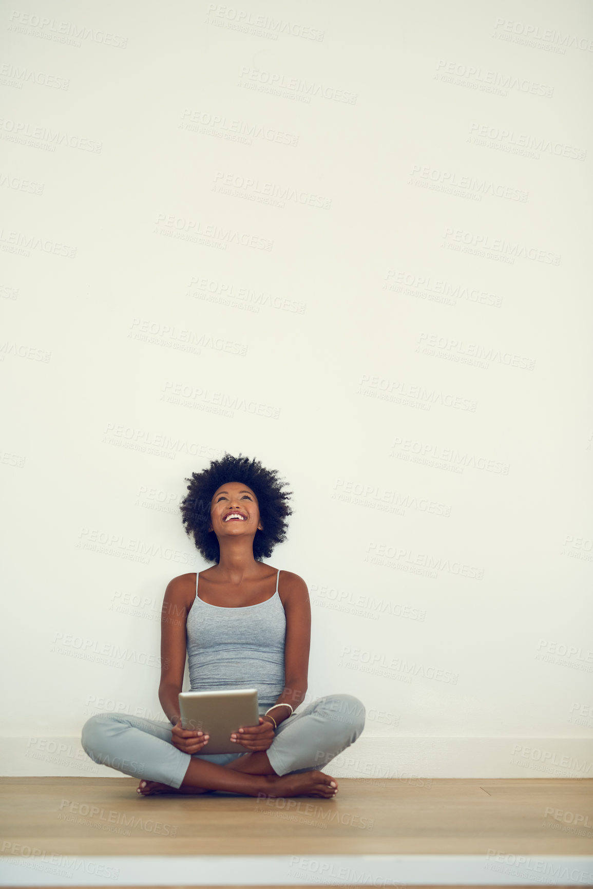 Buy stock photo Black woman, happy and home with tablet on floor for entertainment, social media or internet blog. Technology, female person and smile with confidence in house for online sharing and connectivity 