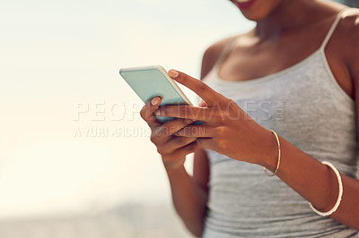 Buy stock photo Woman, typing and outdoor with smartphone replying to text for communication, social media post or internet blog. Technology, female person and outside with mobile for online sharing and connectivity