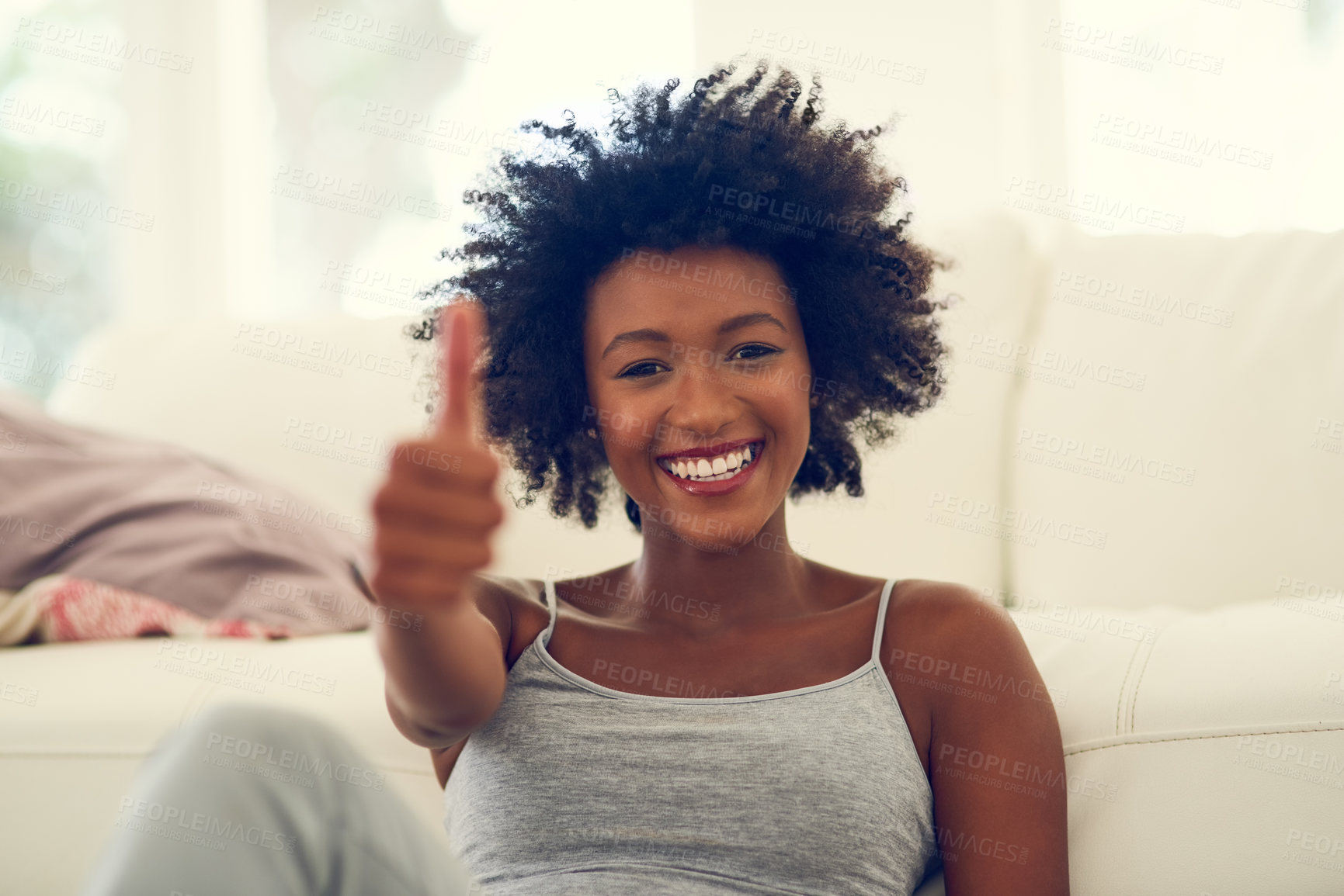 Buy stock photo Black woman, portrait and happy in home with thumbs up for relax, yes to self care and approval on floor of lounge. Girl, smile and hand gesture for agreement, thank you and satisfaction with break