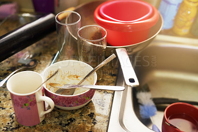 Buy stock photo Shot of dirty dishes in the kitchen