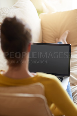 Buy stock photo Laptop screen, remote work and woman on sofa in home on internet, writing blog or mockup space. Display, computer and freelancer in lounge online for social media, relax or reading email on rear view