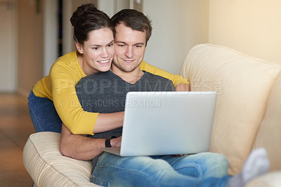 Buy stock photo Couple, laptop and streaming on couch for movie, tv show and entertainment online. Man, woman and embrace in living room for search, social media and happy in apartment while relaxing together