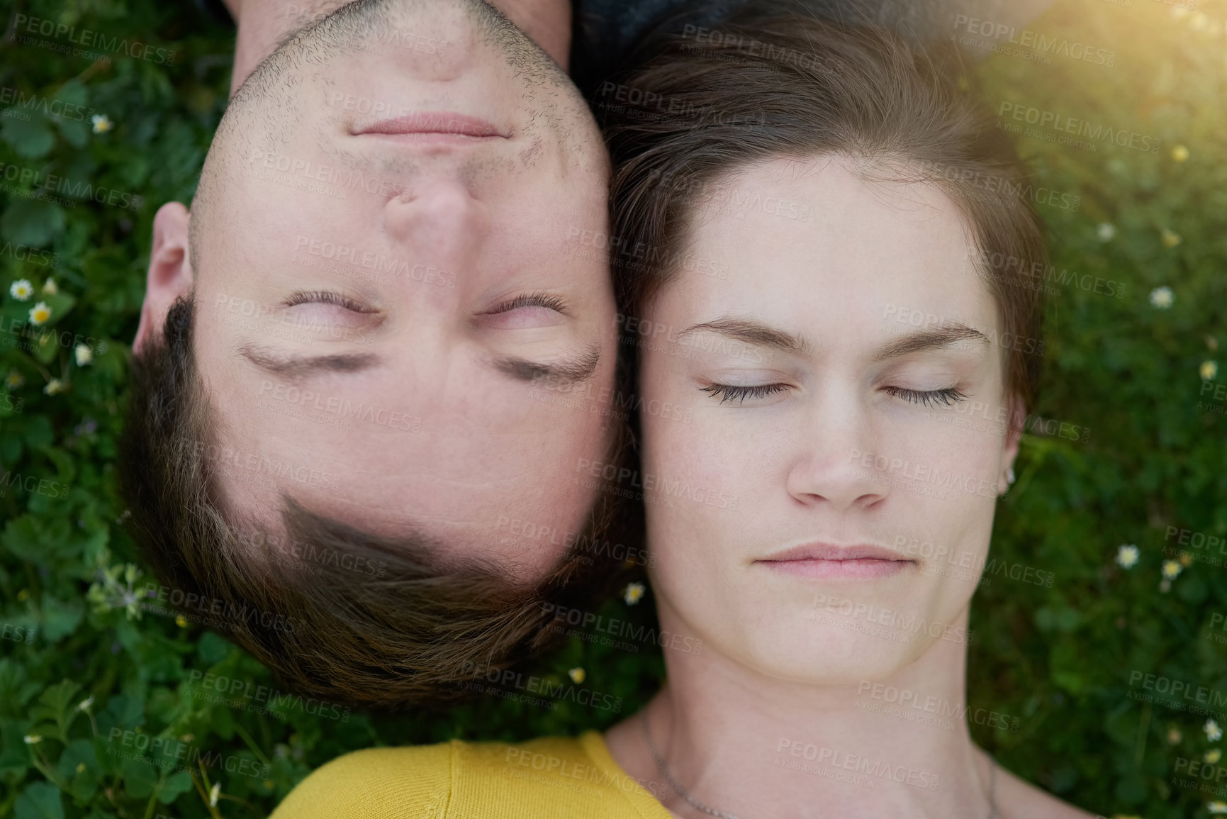 Buy stock photo Couple, relax and eyes closed for bonding, outside and top view with romance or rest. Overhead, calm face and relationship for dating, together and on grass for commitment outdoors in marriage