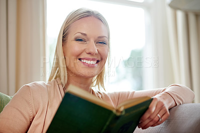 Buy stock photo Woman, smile and portrait with book on sofa for reading in living room for relax with confidence. Female person, notebook and house with pride on weekend with break from work at home with novel