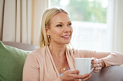 Buy stock photo Woman, thinking and coffee in home, relax and lounge, couch and morning in weekend, peace and break. House, living room and female person with cup, smile and tea to rest, daydreaming and cozy sofa
