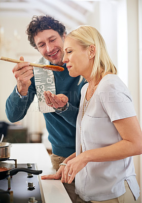 Buy stock photo Couple, kitchen and dinner or cooking with soup and closeup with hand, healthy or mature and sauce. Man, woman and food in home with smile for diet, happiness or together with meal for marriage