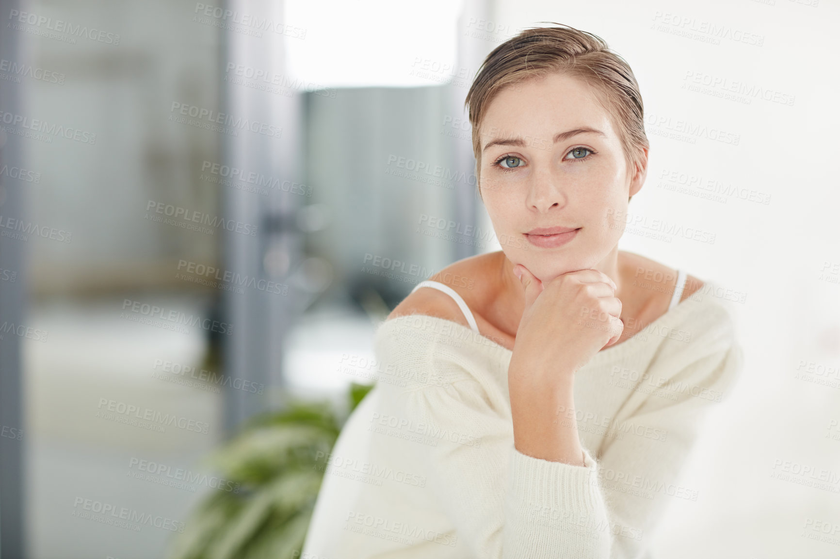 Buy stock photo Portrait of a smiling young woman alone at home