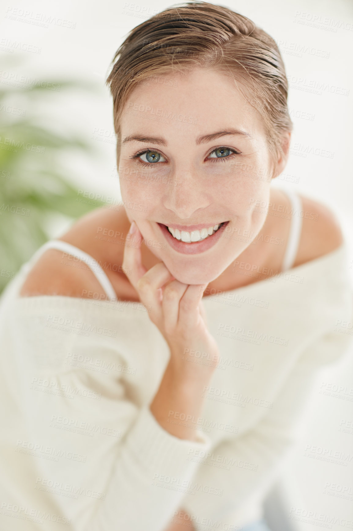 Buy stock photo Portrait of a smiling young woman alone at home