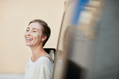 Buy stock photo Portrait of a laughing young woman standing outside