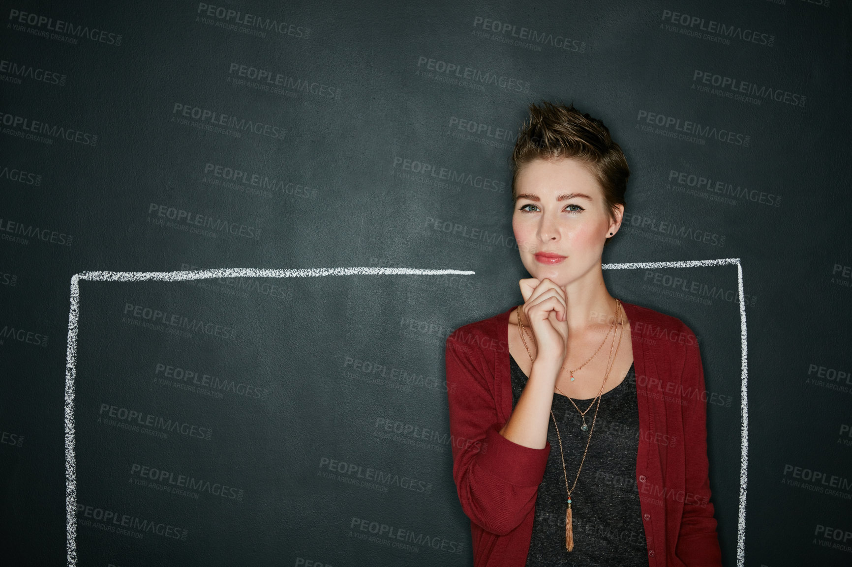 Buy stock photo Studio shot of a thoughtful young woman posing with a chalk illustration of a box against a dark background