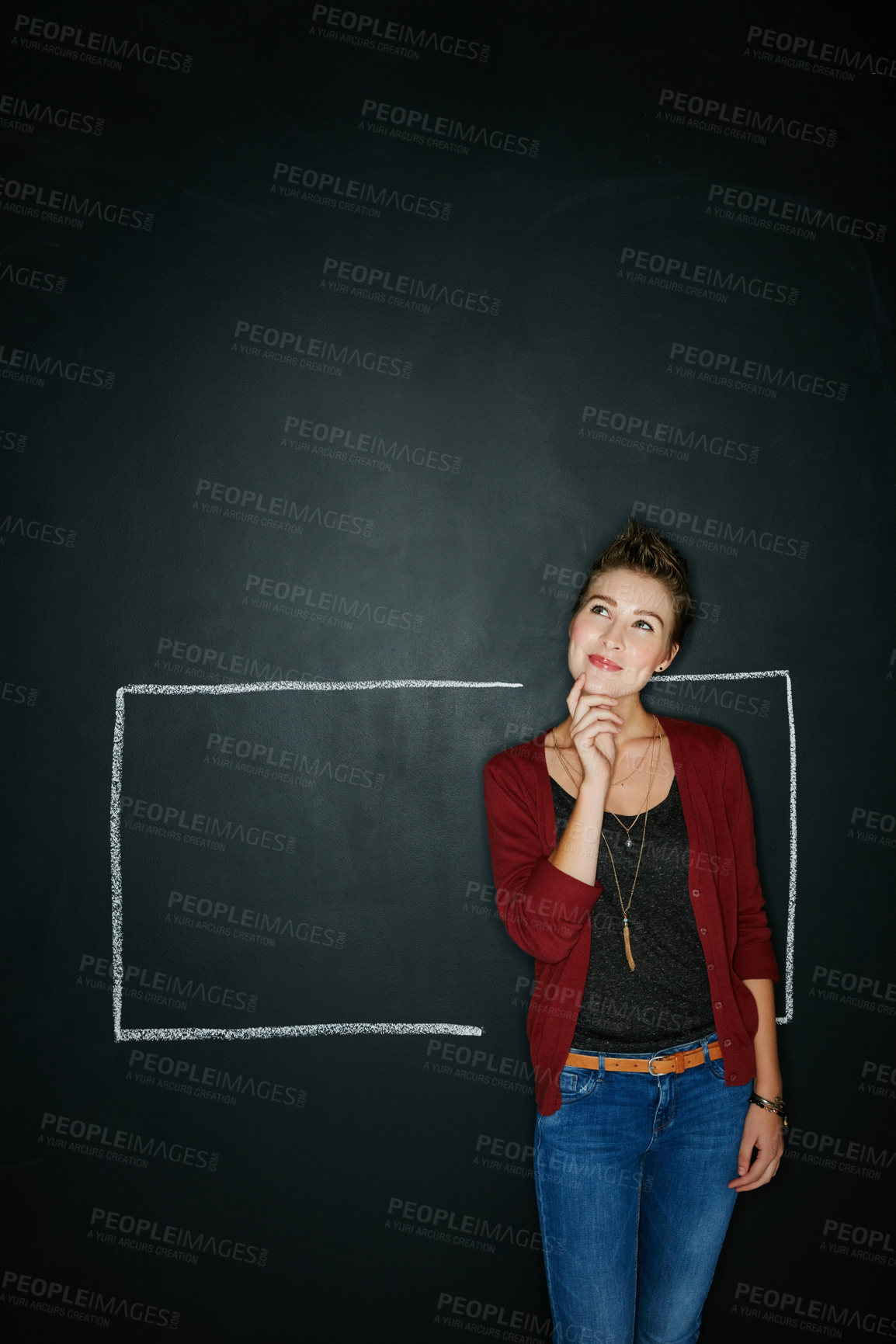 Buy stock photo Studio shot of a thoughtful young woman posing with a chalk illustration of a box against a dark background