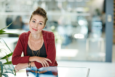 Buy stock photo Portrait of an attractive young businesswoman standing in her office