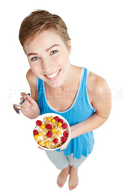 Buy stock photo Portrait, breakfast and diet with a woman in studio isolated on a white background for health from above. Food, muesli and overhead with an attractive young female eating healthy for nutrition