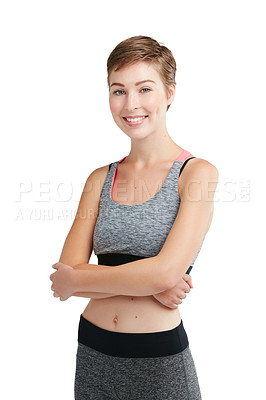 Buy stock photo Studio portrait of a fit young woman posing against a white background