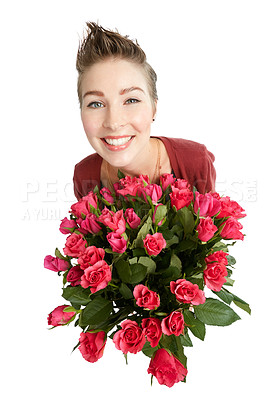 Buy stock photo Studio portrait of a happy young woman holding a bouquet of flowers against a white background