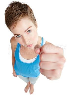 Buy stock photo Top view, woman and fist for anger, fight and furious with female isolated on white studio background. Portrait, girl and lady with gesture for battle, angry or body language for fighting on backdrop