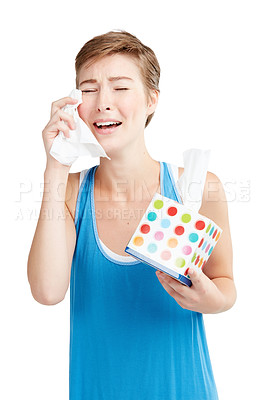 Buy stock photo Crying, breakup and box of tissues with a woman in studio isolated on a white background feeling sad. Cry, sadness and broken heart with a young female on blank space drying her eyes from tears
