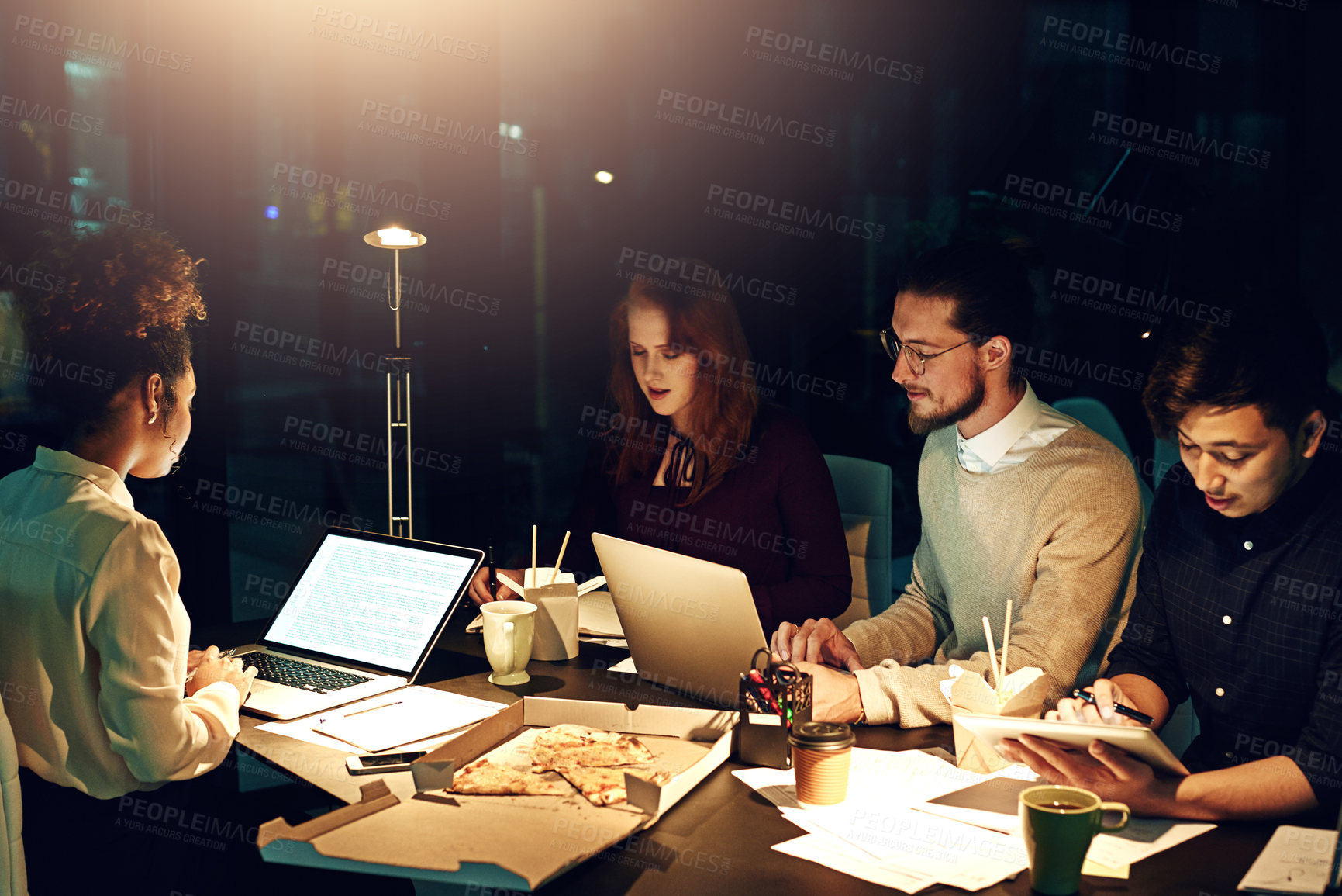 Buy stock photo Business people, laptop and mockup screen at night for team planning, project deadline or strategy at office. Group of employee workers busy working overtime or late evening together on computer