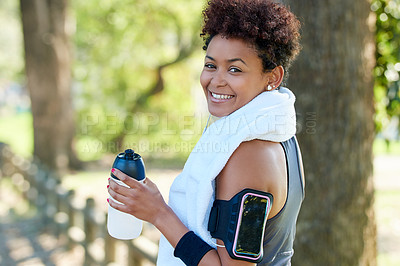Buy stock photo Portrait of a sporty young woman out for a run