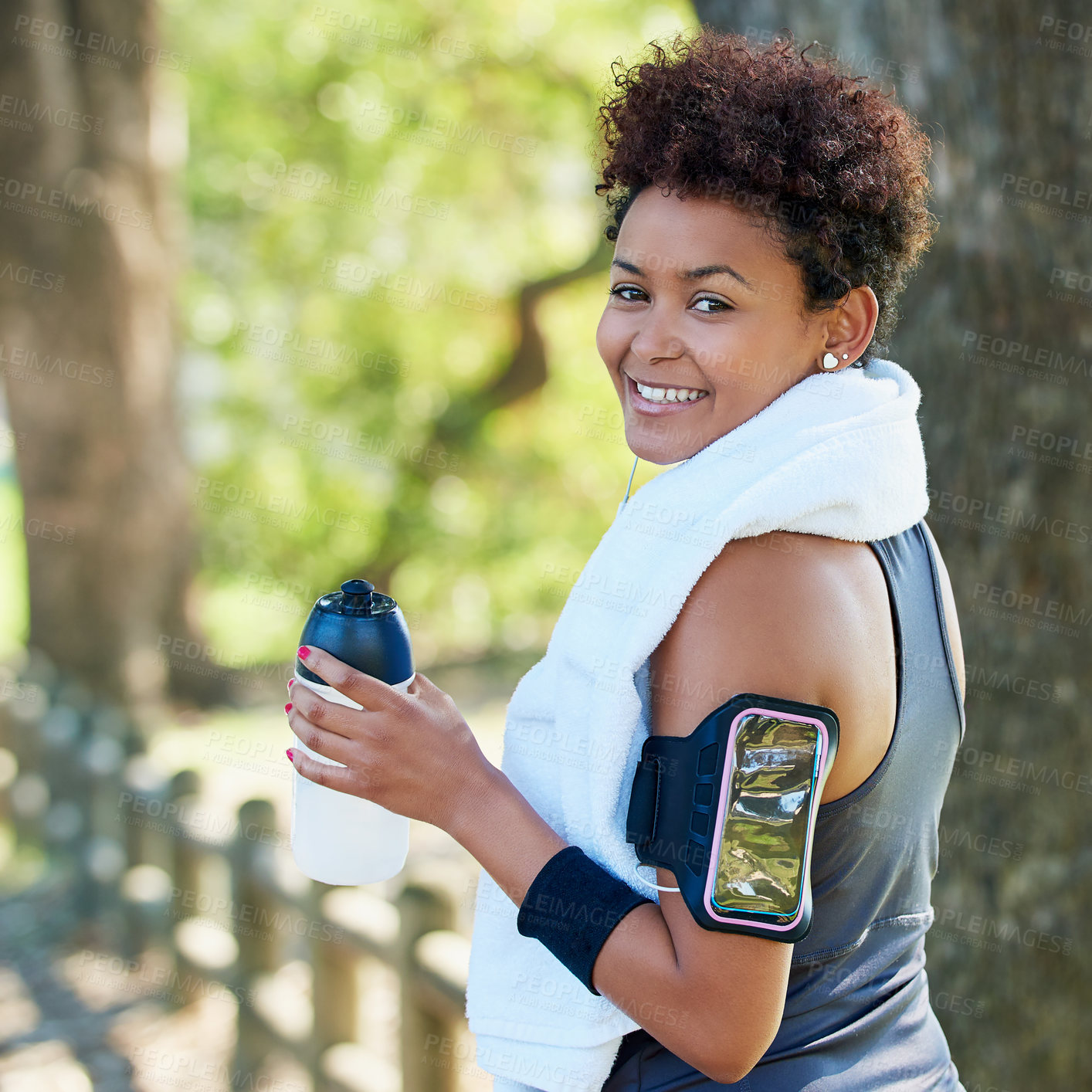 Buy stock photo Portrait of a sporty young woman out for a run