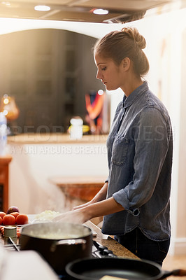 Buy stock photo Cooking, kitchen and female chef with pans for lunch, dinner or supper in a modern house. Diet, wellness and closeup of a woman preparing a healthy meal with food in a pot on a stove at her home.